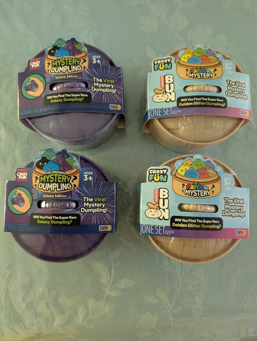 Lot Of 4 Myystery Dumpling Galaxy Edition Purple Set And Golden Glitter Dumpling